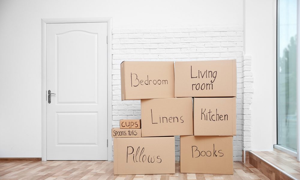 How can you efficiently organize and label your moving boxes?